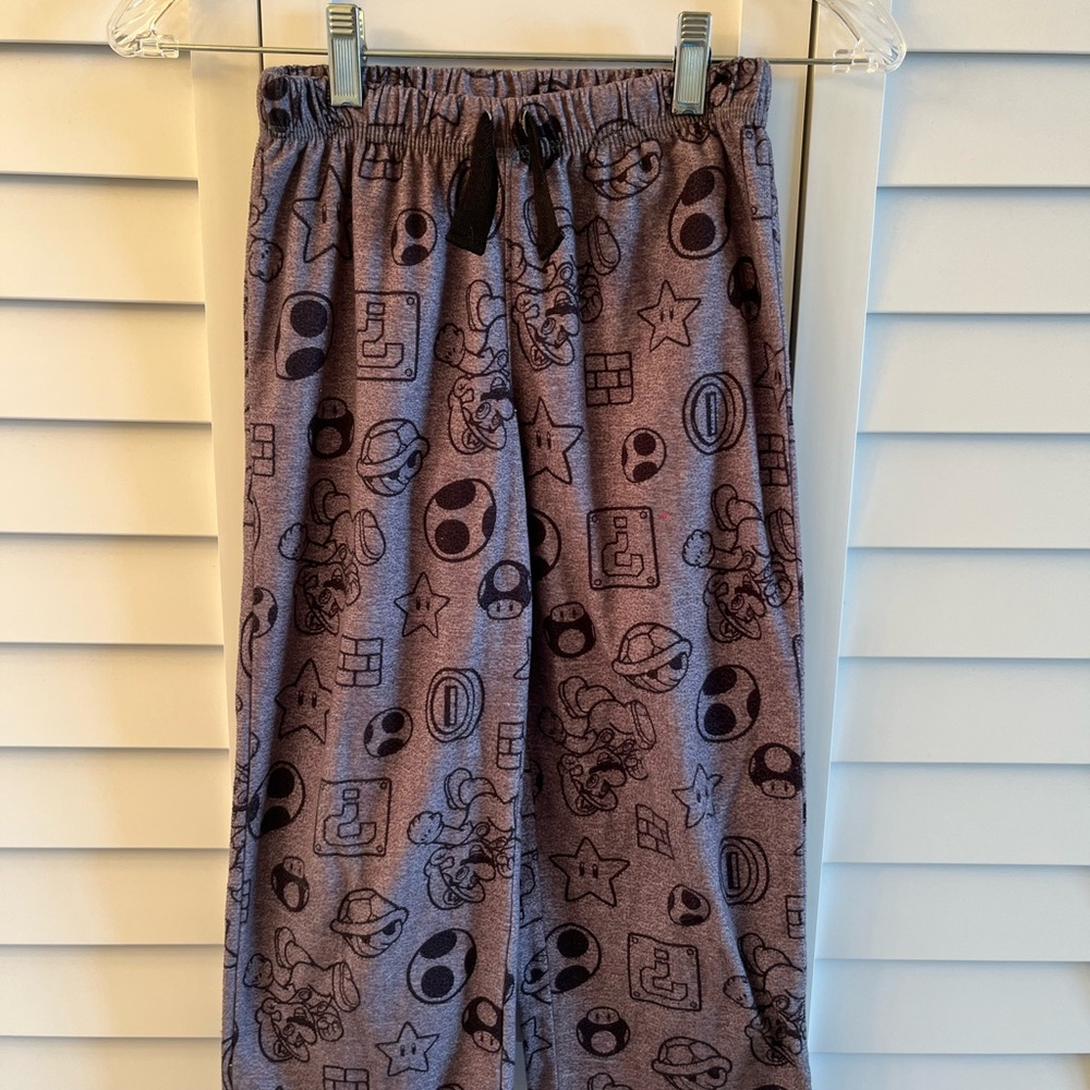Super Mario Sz S childs PJ pants.

Waist 10.5”, inseam 18.5”, rise 8”.

Unisex